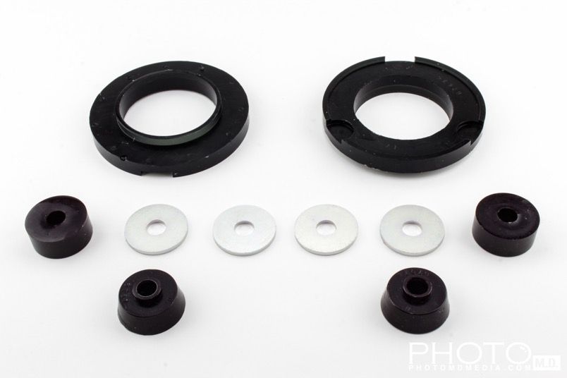 STRUT MOUNT - BUSHING - FRONT - REV064.0004