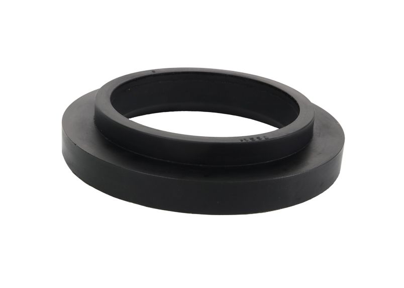 SPRING - PAD/TRIM PACKER BUSHING - REV246.0006