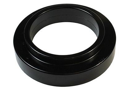 SPRING - PAD/TRIM PACKER BUSHING - REV246.0014